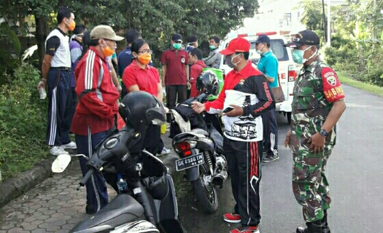 Cegah Covid-19, Kodim-Polres dan Pemkab Karangasem Lakukan Penyemprotan Disinfektan