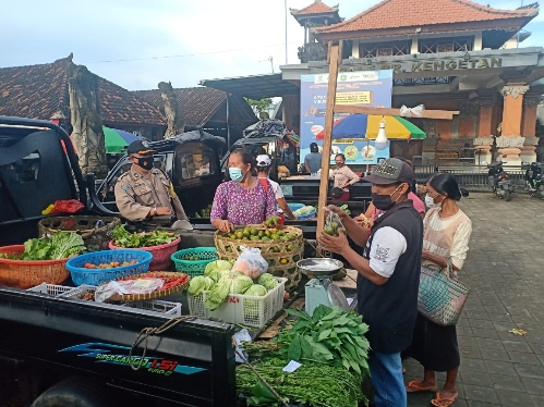 Polsek Ubud, Polres Gianyar Gencar Laksanakan Himbauan Prokes Kepada Masyarakat
