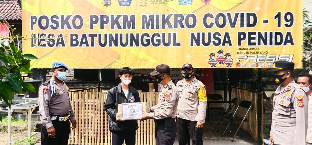 Sambut Hari Bhayangkara ke-75, Polsek Nusa Penida Bagikan Sembako terhadap Warga Kurang Mampu