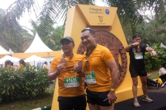 Kapolres Gianyar Ikut Berpartisipasi dalam Maybank Marathon 2022